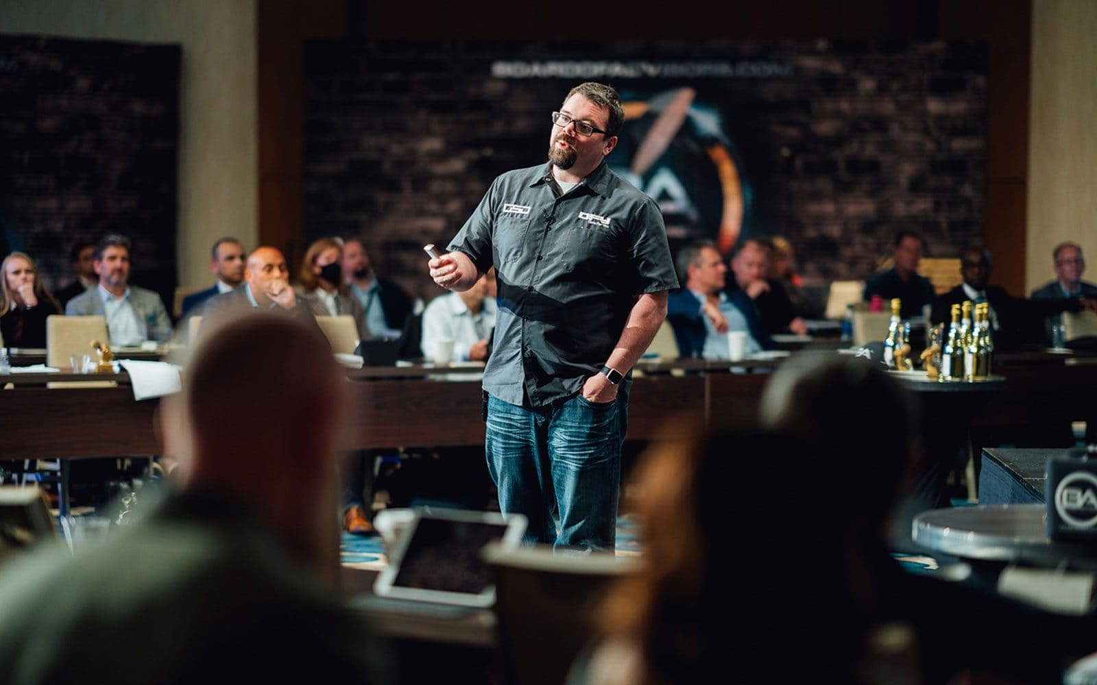 Jason Drohn speaking at a business conference